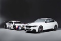 BMW Série 3 M Performance blanc 3/4 avant gauche