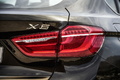 BMW X6 xDrive 50i 2014 - noir - détail, feu arrière