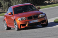 Essai BMW Série 1 M Coupé - orange - 3/4 avant droit, dynamique
