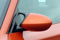 Essai BMW Série 1 M Coupé - orange - détail, rétroviseur
