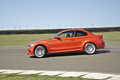 Essai BMW Série 1 M Coupé - orange - profil gauche, drift
