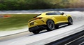 Lamborghini Urus jaune 3/4 arrière droit travelling