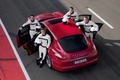 Porsche Panamera GTS rouge 3/4 arrière gauche portes ouvertes vue de haut