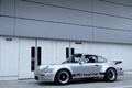 Vente Artcurial - Porsche 911 Carrera 3.0 RSR gris 3/4 avant gauche