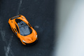 Rétromobile 2018 - McLaren P1 orange 3/4 avant droit vue de haut