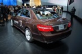 Salon de Detroit 2012 - Mercedes E400H marron 3/4 arrière gauche 