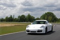 Porsche Cayman Cup blanc 3/4 avant gauche travelling